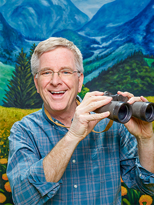 Rick Steves with binoculars, New York Times Magazine